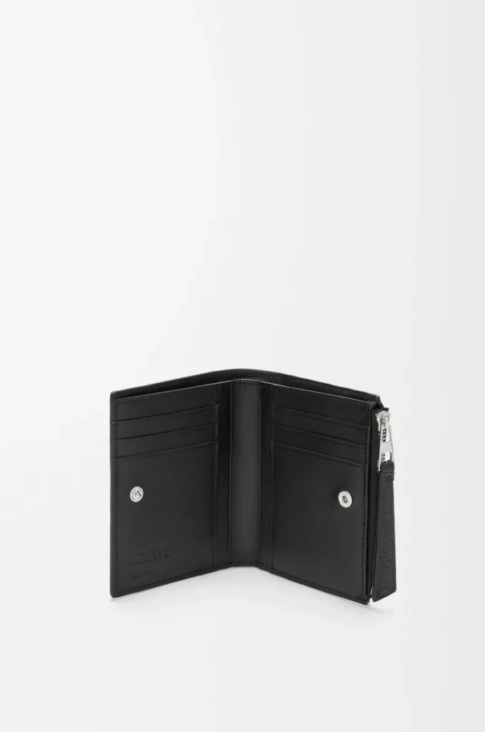 Puzzle slim compact wallet in supple grained calfskin Black Puzzle slim compact wallet in supple grained calfskin Black