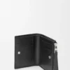 Puzzle slim compact wallet in supple grained calfskin Black Puzzle slim compact wallet in supple grained calfskin Black