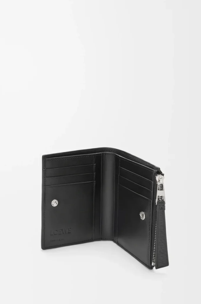 Puzzle slim compact wallet in supple grained calfskin Black Puzzle slim compact wallet in supple grained calfskin Black