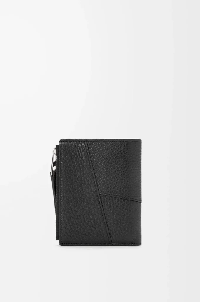 Puzzle slim compact wallet in supple grained calfskin Black Puzzle slim compact wallet in supple grained calfskin Black