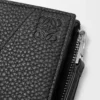 Puzzle slim compact wallet in supple grained calfskin Black Puzzle slim compact wallet in supple grained calfskin Black