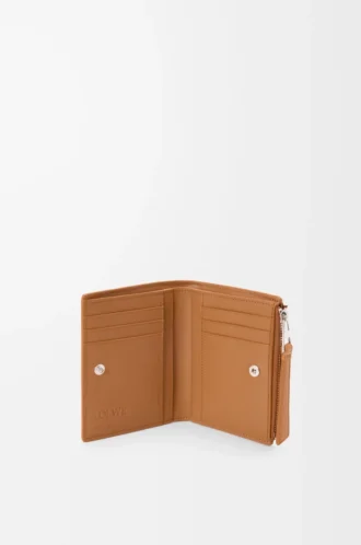 Puzzle slim compact wallet in supple grained calfskin Light Canyon Brown