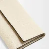 Repeat small vertical wallet in embossed silk calfskin Light Oat Repeat small vertical wallet in embossed silk calfskin Light Oat