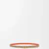 Reversible Anagram cube belt in smooth calfskin Clay Green/Vivid Orange/Gold Reversible Anagram cube belt in smooth calfskin Clay Green/Vivid Orange/Gold