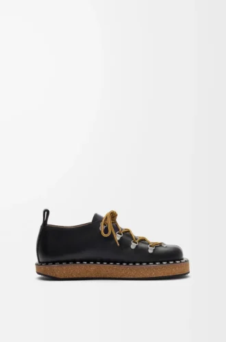 Rivet lace-up in vegetable-tanned calfskin Black