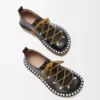 Rivet lace-up in vegetable-tanned calfskin Black Rivet lace-up in vegetable-tanned calfskin Black