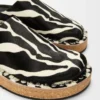 Rivet mule in hairy calfskin Black/White