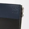 Slim compact wallet in shiny calfskin Black/Deep Navy Slim compact wallet in shiny calfskin Black/Deep Navy