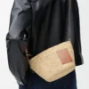 Slit pochette bag in raffia and calfskin Natural/Tan Slit pochette bag in raffia and calfskin Natural/Tan