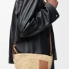 Slit pochette bag in raffia and calfskin Natural/Tan Slit pochette bag in raffia and calfskin Natural/Tan