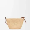 Slit pochette bag in raffia and calfskin Natural/Tan Slit pochette bag in raffia and calfskin Natural/Tan