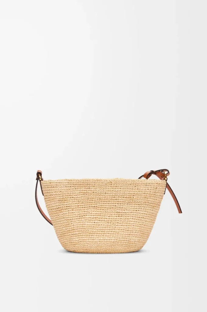 Slit pochette bag in raffia and calfskin Natural/Tan Slit pochette bag in raffia and calfskin Natural/Tan