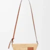 Slit pochette bag in raffia and calfskin Natural/Tan Slit pochette bag in raffia and calfskin Natural/Tan
