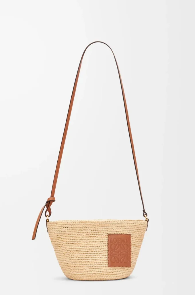 Slit pochette bag in raffia and calfskin Natural/Tan Slit pochette bag in raffia and calfskin Natural/Tan