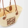 Small Anagram Basket bag in iraca palm and calfskin Natural/Tan Small Anagram Basket bag in iraca palm and calfskin Natural/Tan