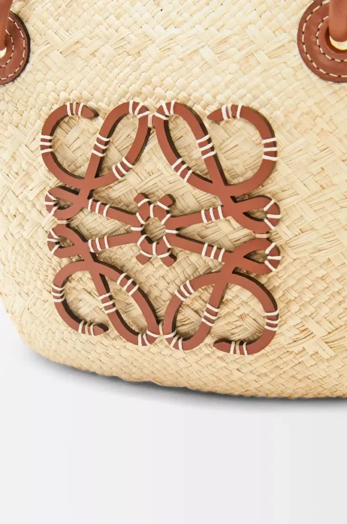 Small Anagram Basket bag in iraca palm and calfskin Natural/Tan Small Anagram Basket bag in iraca palm and calfskin Natural/Tan