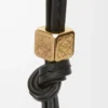 Small Anagram strap in calfskin Black Tonal/Gold Small Anagram strap in calfskin Black Tonal/Gold