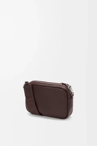 Small Pebble messenger bag in supple grained calfskin Oxblood