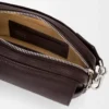 Small Pebble messenger bag in supple grained calfskin Oxblood Small Pebble messenger bag in supple grained calfskin Oxblood