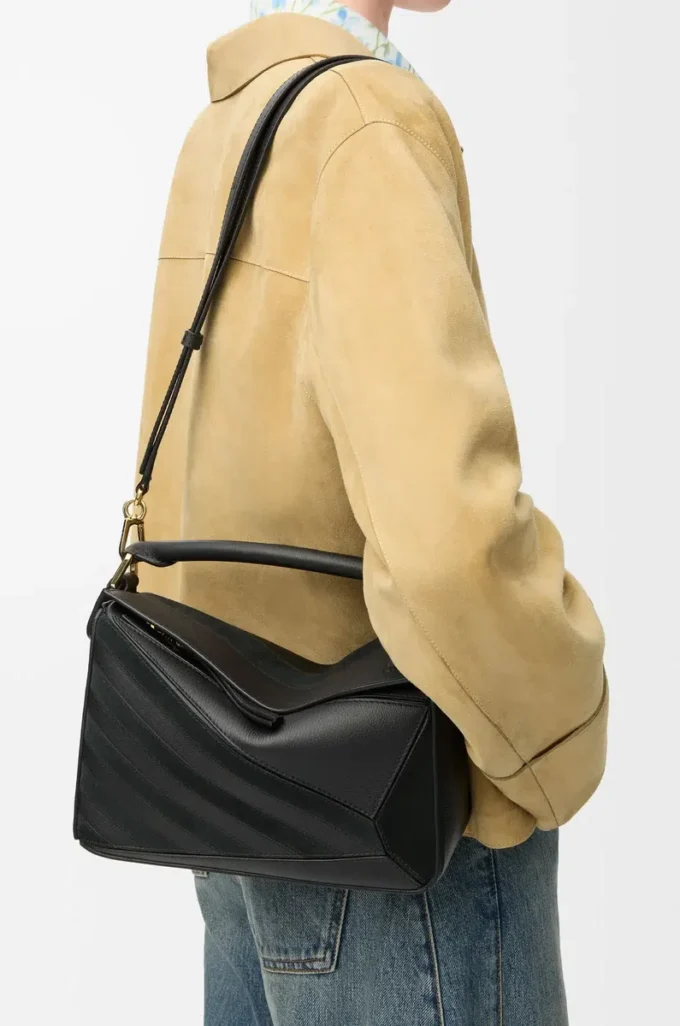 Small Puzzle bag in classic calfskin and suede Black Small Puzzle bag in classic calfskin and suede Black