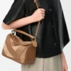 Small Puzzle bag in classic calfskin and suede Oak Small Puzzle bag in classic calfskin and suede Oak