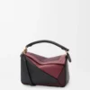 Small Puzzle bag in nappa calfskin Black/Burgundy Small Puzzle bag in nappa calfskin Black/Burgundy