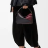 Small Puzzle bag in nappa calfskin Black/Burgundy Small Puzzle bag in nappa calfskin Black/Burgundy