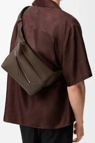 Small Puzzle bumbag in grained calfskin Dark Cigar