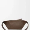 Small Puzzle bumbag in grained calfskin Dark Cigar