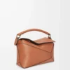 Small Puzzle Edge bag in classic calfskin Tan Small Puzzle Edge bag in classic calfskin Tan