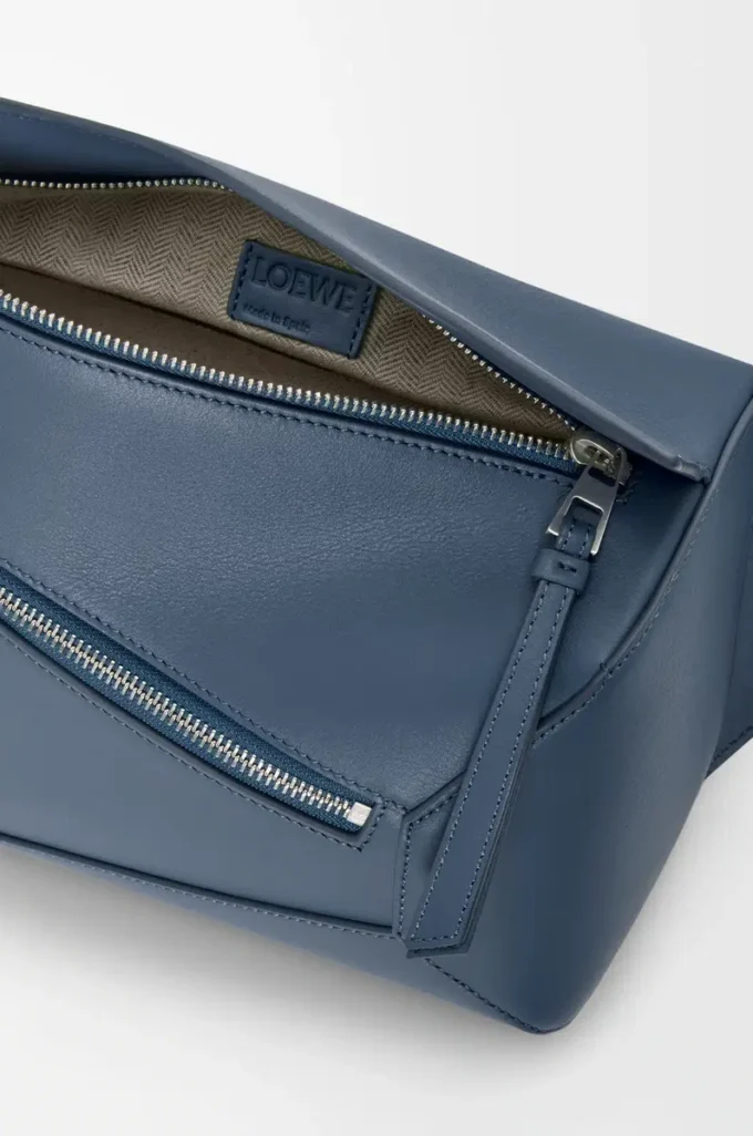Small Puzzle Edge bumbag in classic calfskin Indigo Dye