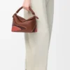 Small Puzzle Edge Landscape bag in nappa calfskin Pecan/Parrot Pink Small Puzzle Edge Landscape bag in nappa calfskin Pecan/Parrot Pink