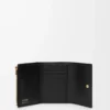 Small vertical wallet in smooth and grained calfskin Black Small vertical wallet in smooth and grained calfskin Black