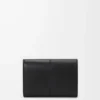 Small vertical wallet in smooth and grained calfskin Black Small vertical wallet in smooth and grained calfskin Black