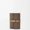 Small vertical wallet in soft grained calfskin Taupe/Gold Small vertical wallet in soft grained calfskin Taupe/Gold