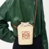 Square pocket in iraca palm and calfskin Natural/Tan Square pocket in iraca palm and calfskin Natural/Tan
