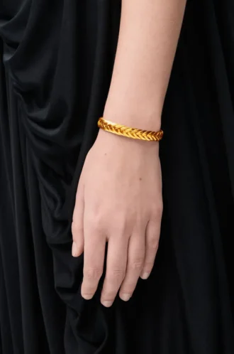 Thin braided cuff in sterling silver Gold