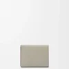 Trifold wallet in soft grained calfskin Shell Grey/Eucalyptus Trifold wallet in soft grained calfskin Shell Grey/Eucalyptus