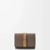 Trifold wallet in soft grained calfskin Taupe/Gold Trifold wallet in soft grained calfskin Taupe/Gold