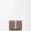 Trifold wallet in soft grained calfskin Taupe/Talc Trifold wallet in soft grained calfskin Taupe/Talc