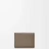 Trifold wallet in soft grained calfskin Taupe/Talc Trifold wallet in soft grained calfskin Taupe/Talc