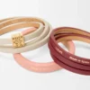 Twist double bracelet in calfskin Light Ghost/Burgundy Twist double bracelet in calfskin Light Ghost/Burgundy