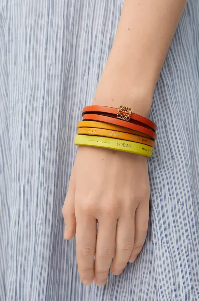 Twist double bracelet in calfskin Vivid Orange/Yellow Twist double bracelet in calfskin Vivid Orange/Yellow