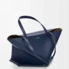 XL Puzzle Fold tote in shiny calfskin Abyss Blue XL Puzzle Fold tote in shiny calfskin Abyss Blue