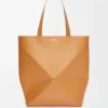 XL Puzzle Fold tote in shiny calfskin Warm Desert XL Puzzle Fold tote in shiny calfskin Warm Desert