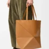 XL Puzzle Fold tote in shiny calfskin Warm Desert XL Puzzle Fold tote in shiny calfskin Warm Desert