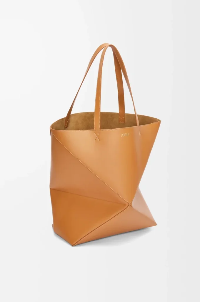 XL Puzzle Fold tote in shiny calfskin Warm Desert XL Puzzle Fold tote in shiny calfskin Warm Desert